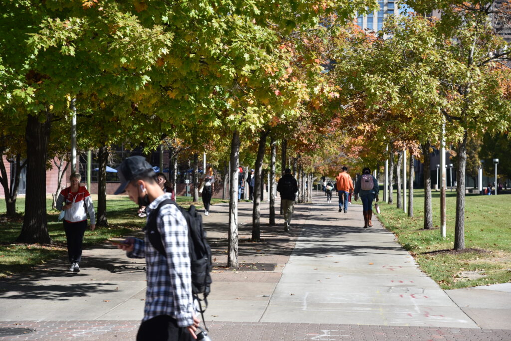 Parking & Transportation - Students walking on campus